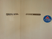 Image: WC towel hooks and a strange sign - Click to Enlarge