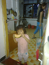 Image: 'Monkeys' eat fruit - Click to Enlarge